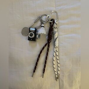 Brown and White Badminton and Camera Keychain Set